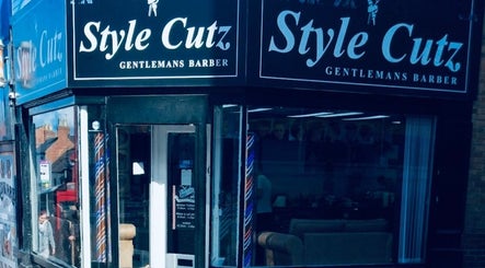Exterior view of Style Cutz barber shop in Ilkeston, England, GB, showcasing its inviting entrance.