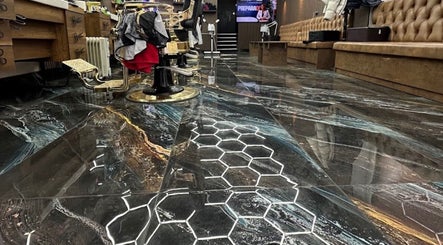 Stylish barbershop interior with luxurious seating and decor at Style Cutz, Ilkeston, England, GB.