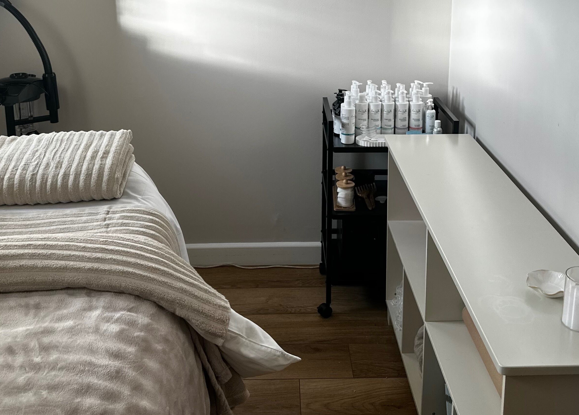 Relaxing treatment room with massage bed at Beauty by Claudie in Gamlingay, England, GB.