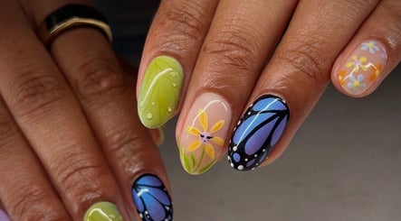 Colorful floral nail art at Speakeasy Nail Studio, Lynnwood, Washington, US.