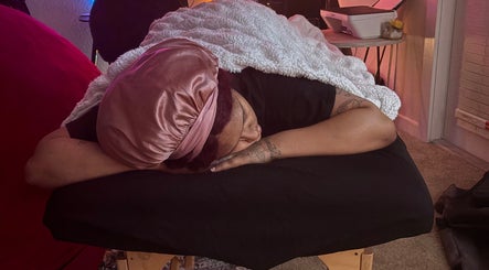Person enjoys a restful massage at Imperfect Beauty Bar in Grand Prairie, Texas, US.