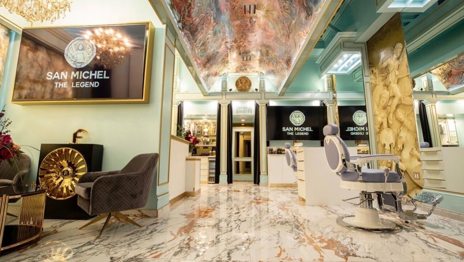 Elegant interior of San Michel The Legend Barbershop, Glendale, California, US with luxurious décor and seating.