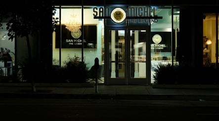 Night view of San Michel The Legend Barbershop in Glendale, California, US, with elegant lighting.