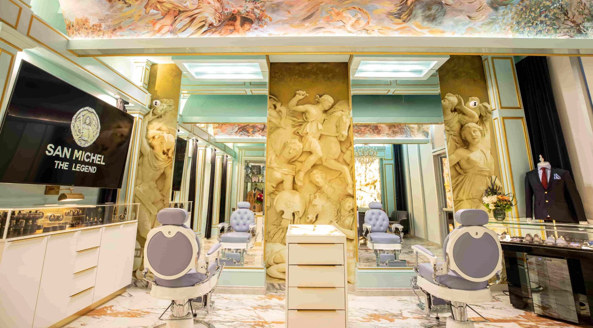 Luxurious interior of San Michel The Legend Barbershop in Glendale, California, US with elegant chairs and decor.