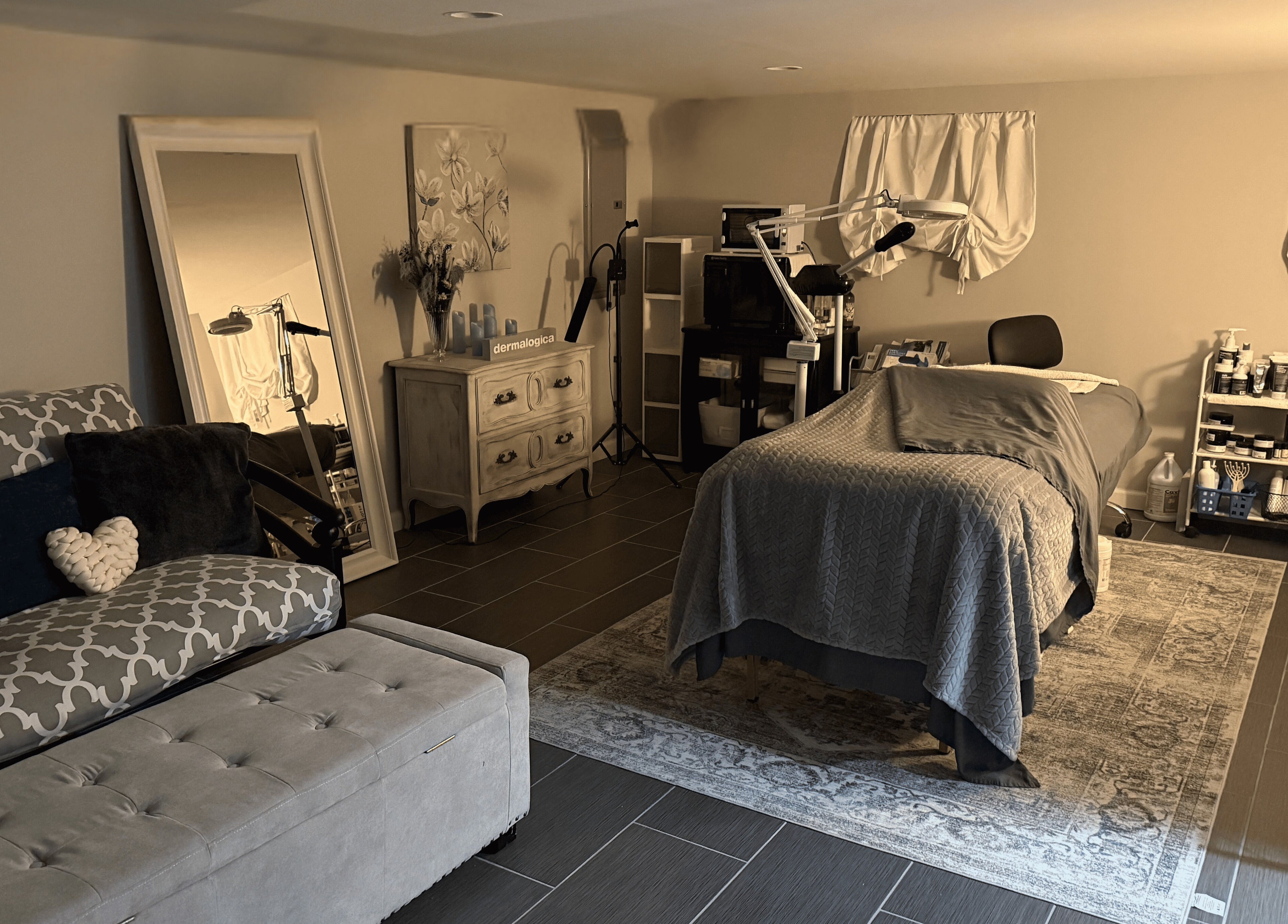 Tranquil treatment room at Heart and Soul Dream Spa in Oceanside, New York, US featuring cozy decor.