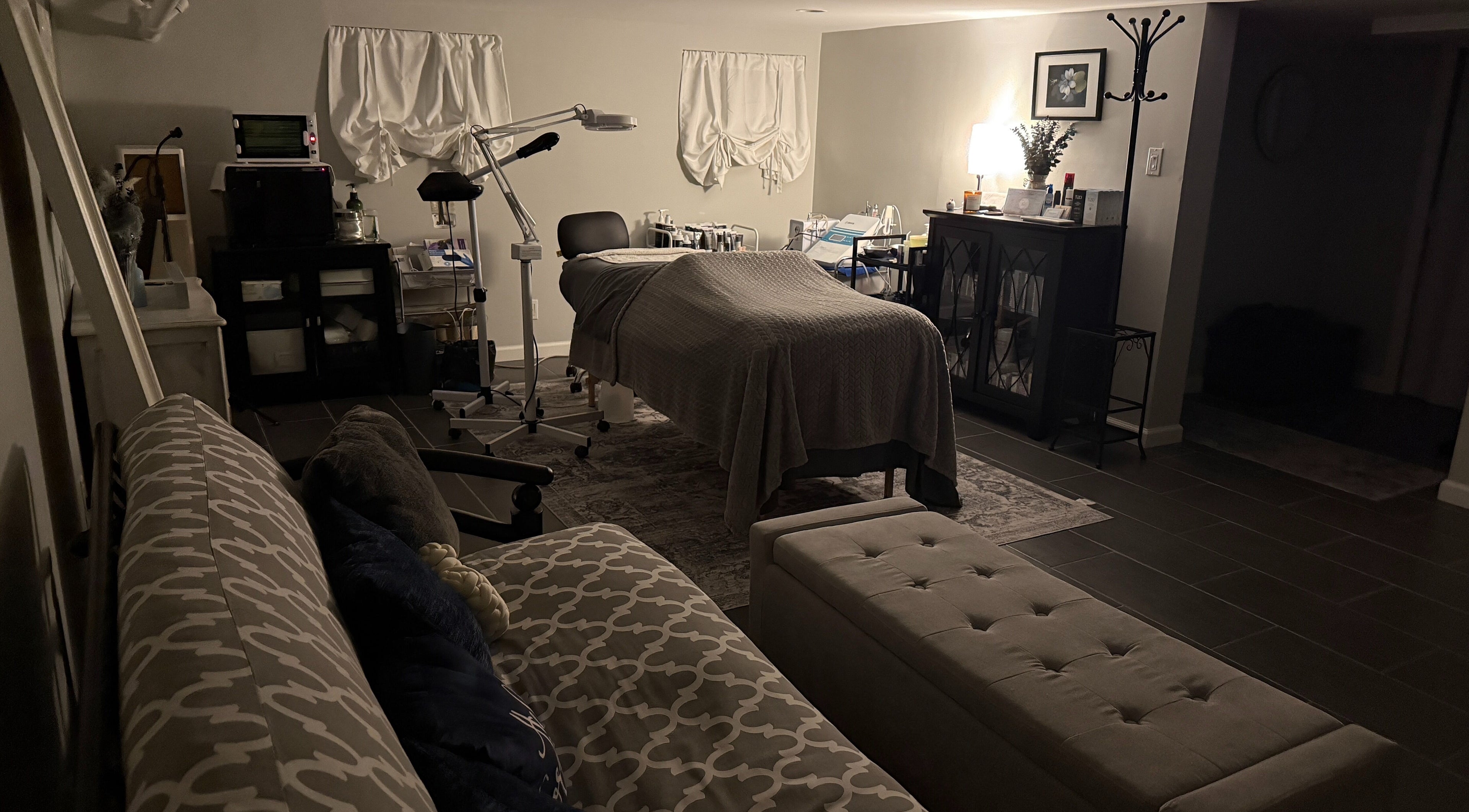 Relaxing spa treatment room at Heart and Soul Dream Spa, Oceanside, New York, US, with cozy lighting and decor.