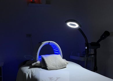 Tranquil spa room at Cabo Glow Salon in San José Del Cabo with a modern treatment setup.
