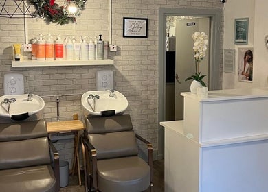 Interior of Brave, strong, beautiful salon at Edinburgh, Scotland, GB with modern washing stations.