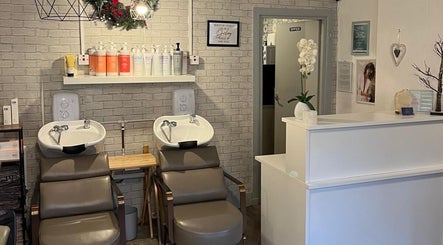Interior of Brave, strong, beautiful salon at Edinburgh, Scotland, GB with modern washing stations.