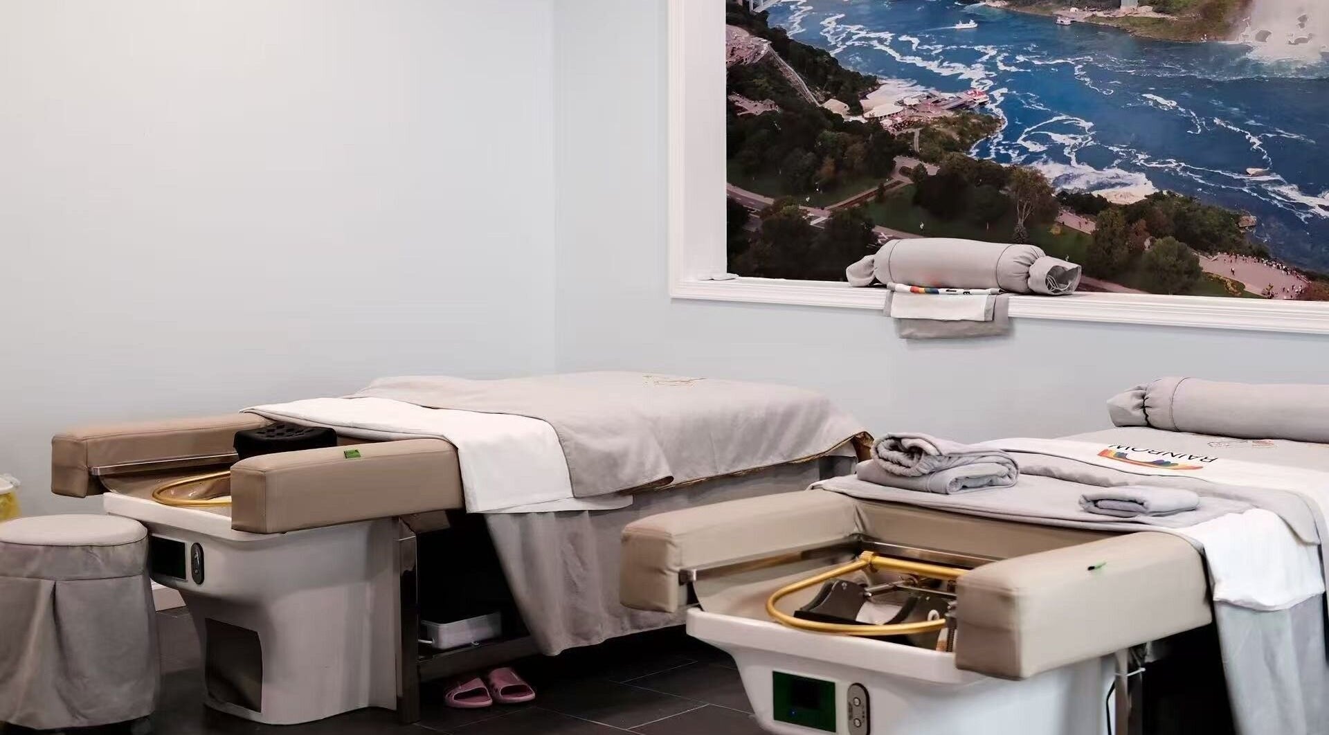 Peaceful treatment room at Rainbow Beauty Spa in Norristown, Pennsylvania, US with massage beds and scenic decor.