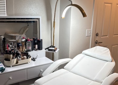 Elegant makeup station at Shohina_makeup, Kent, Washington, US, featuring brushes and products.