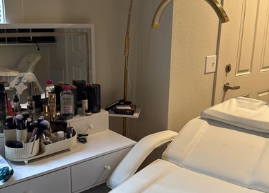 Makeup and beauty station at Shohina_makeup, Kent, Washington, US, featuring brushes and products.