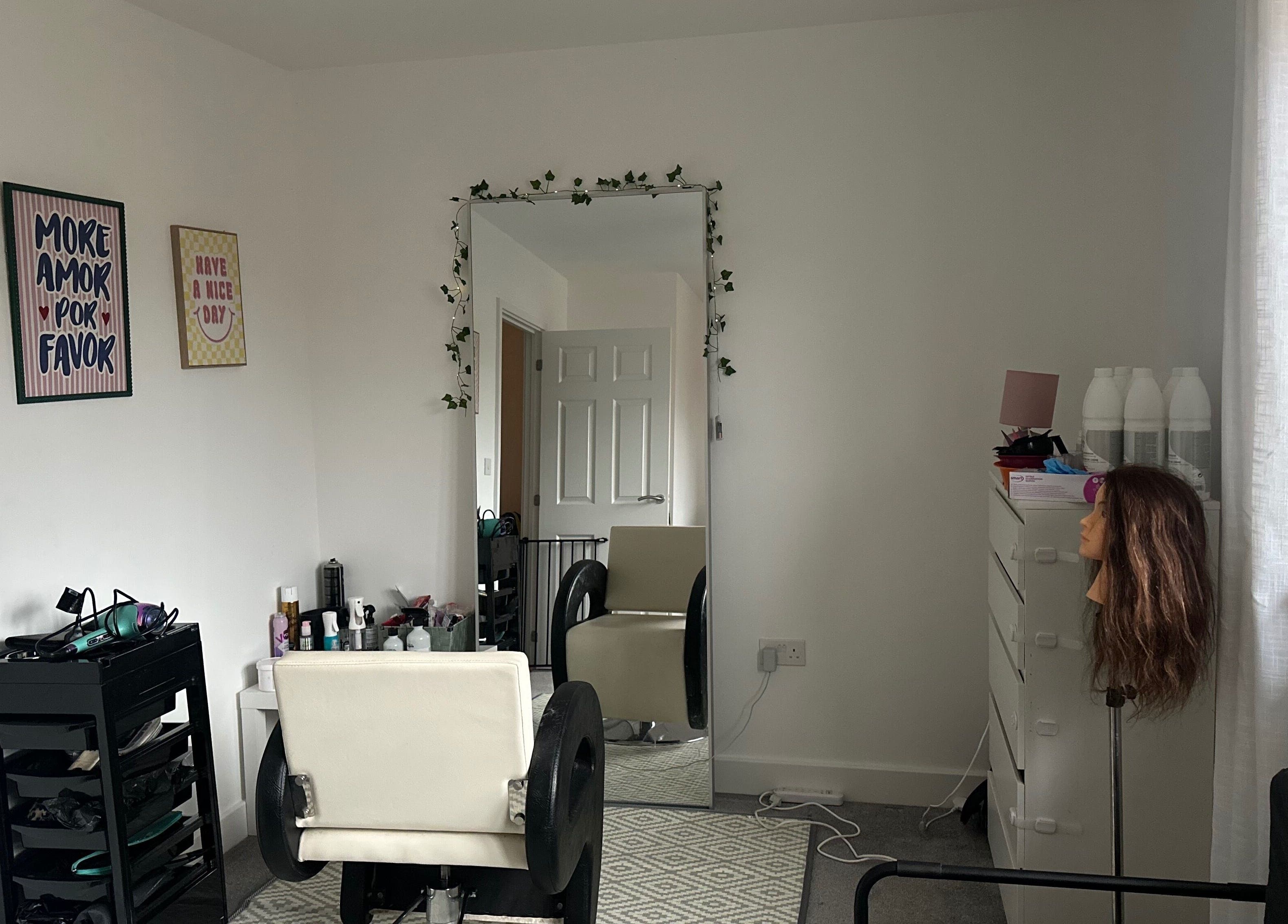 Inviting salon interior at Blowoutbysophieelle, Wokingham, England, GB with modern decor and unique styling chair.