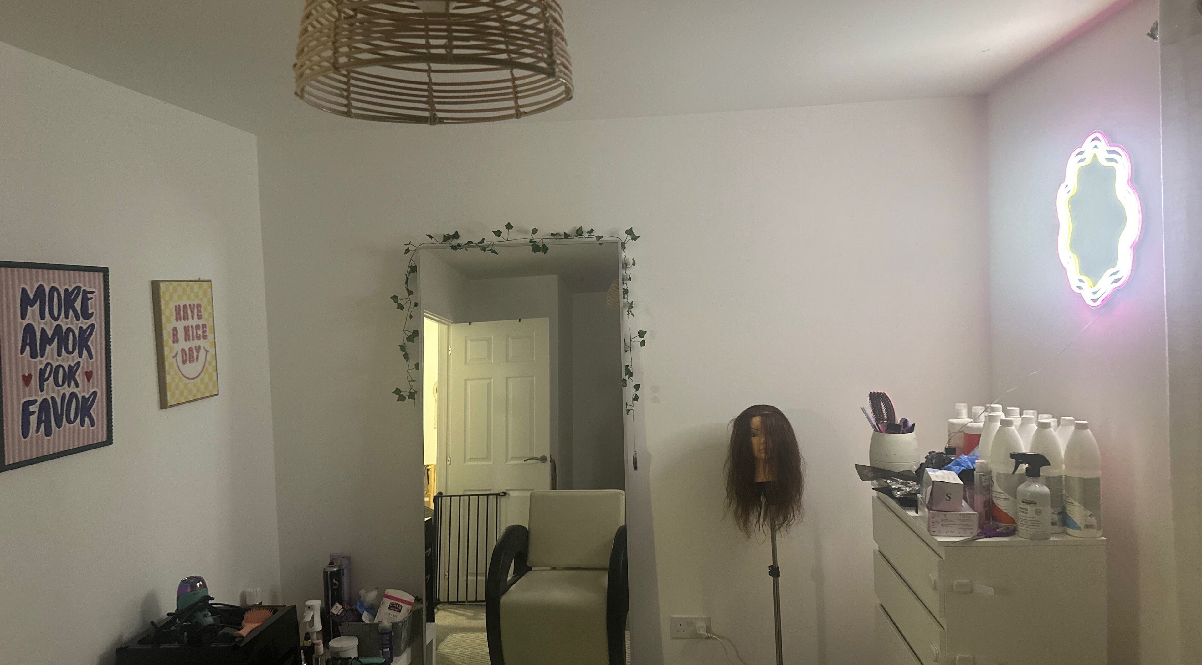 Stylish salon interior at Blowoutbysophieelle in Wokingham, England, GB, showcasing decor and hairdressing tools.