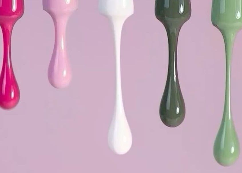 Vibrant nail polish drips displayed at Lumi Nail Studio in Vancouver, British Columbia, CA.