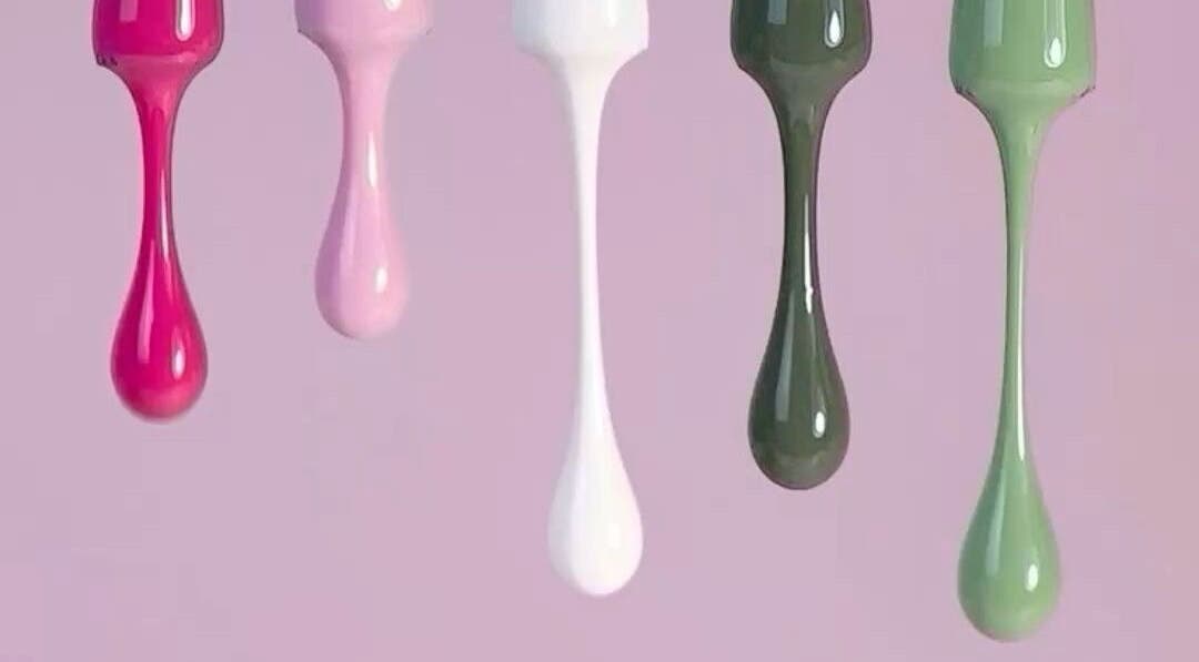 Vibrant nail polish drips displayed at Lumi Nail Studio in Vancouver, British Columbia, CA.