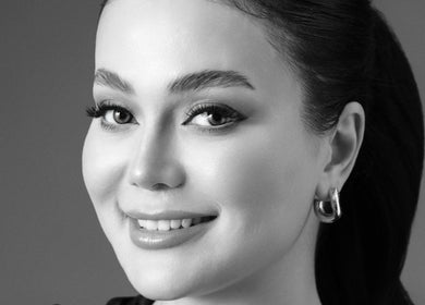 Close-up of a smiling woman showcasing makeup artistry at Mansi Beauty Nz, Auckland, Auckland, NZ.