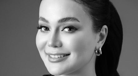 Close-up of a smiling woman showcasing makeup artistry at Mansi Beauty Nz, Auckland, Auckland, NZ.