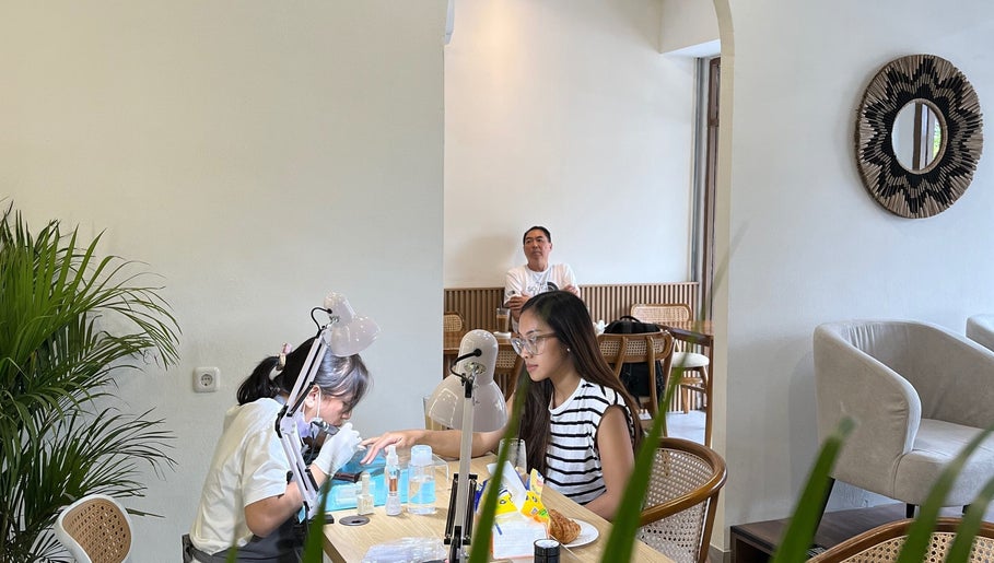 Nail technician at work in Kailena Beauty Studio, Bali, Bali, ID. Modern interior and relaxing ambiance.