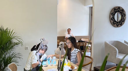 Nail technician at work in Kailena Beauty Studio, Bali, Bali, ID. Modern interior and relaxing ambiance.