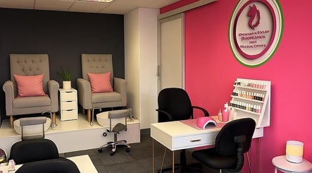 Stylish interior of Graceful & Stylish Beauty Salon and Training Center, Sandton, Gauteng, ZA with pink decor.
