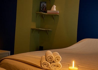 A tranquil massage room with candles at Shanti massage, Montréal, Québec, CA.