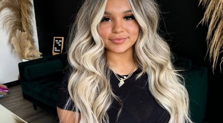 Client with styled wavy hair at Barbara SPA Queen in Dallas, Texas, US.