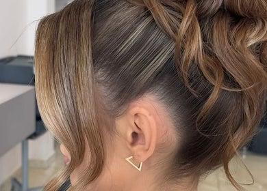 Sophisticated updo hairstyle at Barbara SPA Queen, Dallas, Texas, US. Perfect for any occasion.