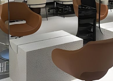 Modern salon chairs at Nail Station in Doha, Doha Municipality, QA, showcasing stylish comfort.