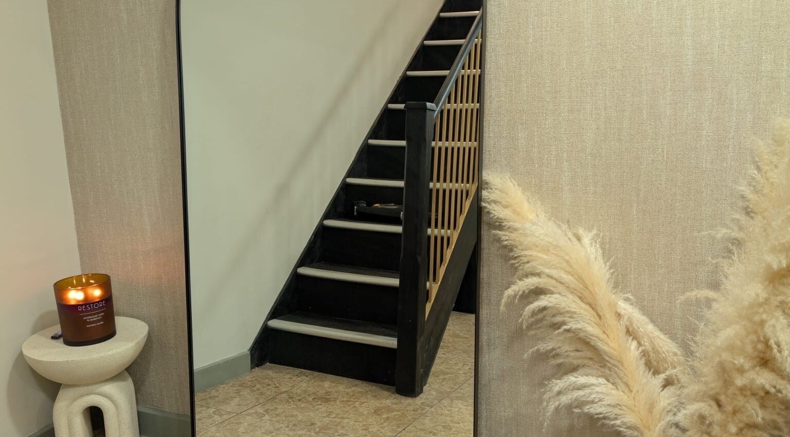 Elegant staircase view at Hair by Ava in Leeds, England, GB, with calming decor.