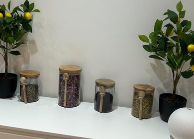 Herbal jars and lemon plants at Sanctum By Gemma, Beacon Hill, England, GB, creating a serene ambiance.