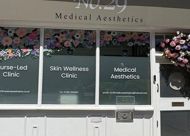 Sanctum By Gemma, Beacon Hill, England, GB - Elegant clinic entrance with floral decor and wellness signage.
