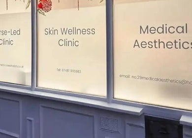 Sanctum By Gemma front window display at Beacon Hill, England, GB advertising nurse-led clinic and medical aesthetics.