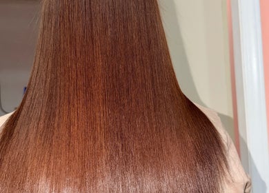 Smooth, glossy brown hair styled at Elenes Beauty, Mexicali, Baja California, MX.