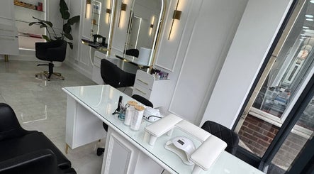 Elegant salon interior at THE MOST BEAUTY & AESTHETICS, Exeter, England, GB, featuring modern styling chairs.