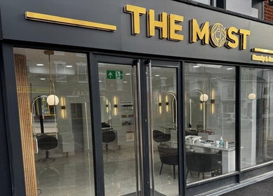 THE MOST BEAUTY & AESTHETICS front facade in Exeter, England, GB with sleek modern design.