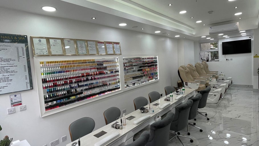 Elegant interior of MK Nails and Spa Fulham Ltd in London, England, GB featuring modern nail stations.
