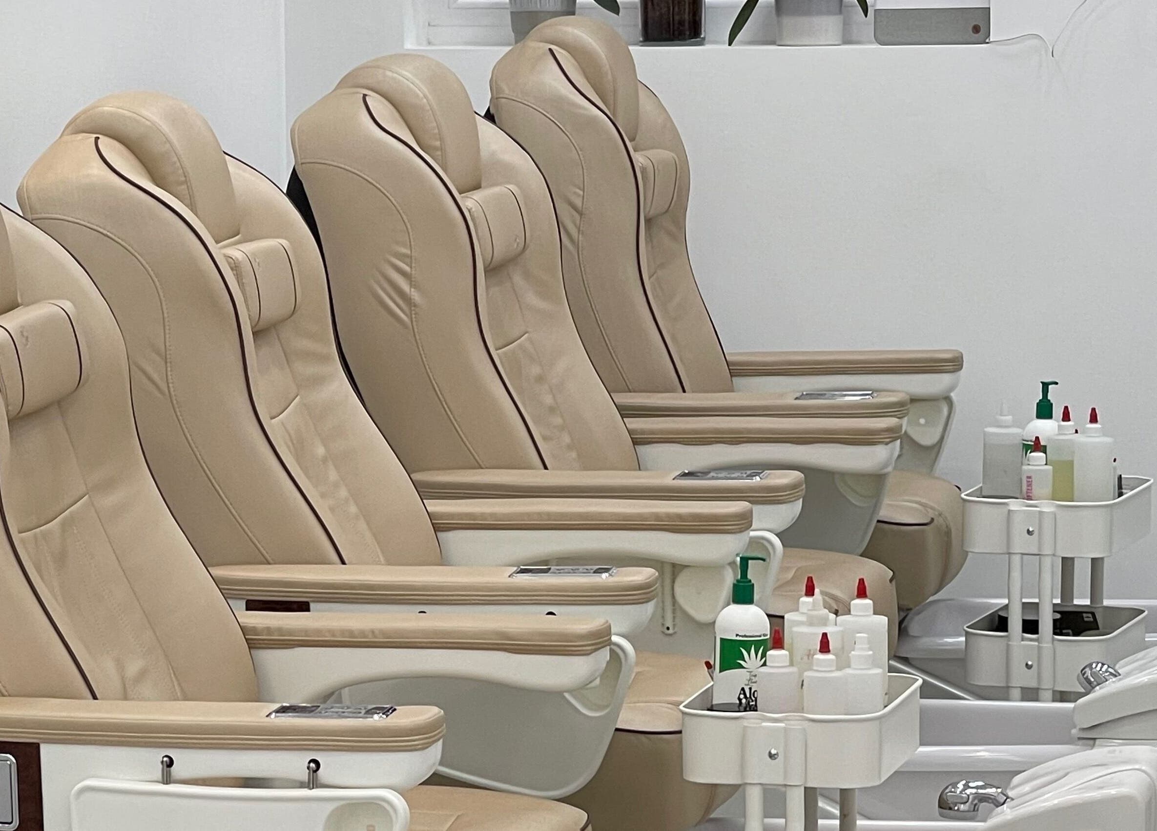 Luxurious pedicure chairs at MK Nails and Spa Fulham Ltd, London, England, GB, offering relaxation and comfort.