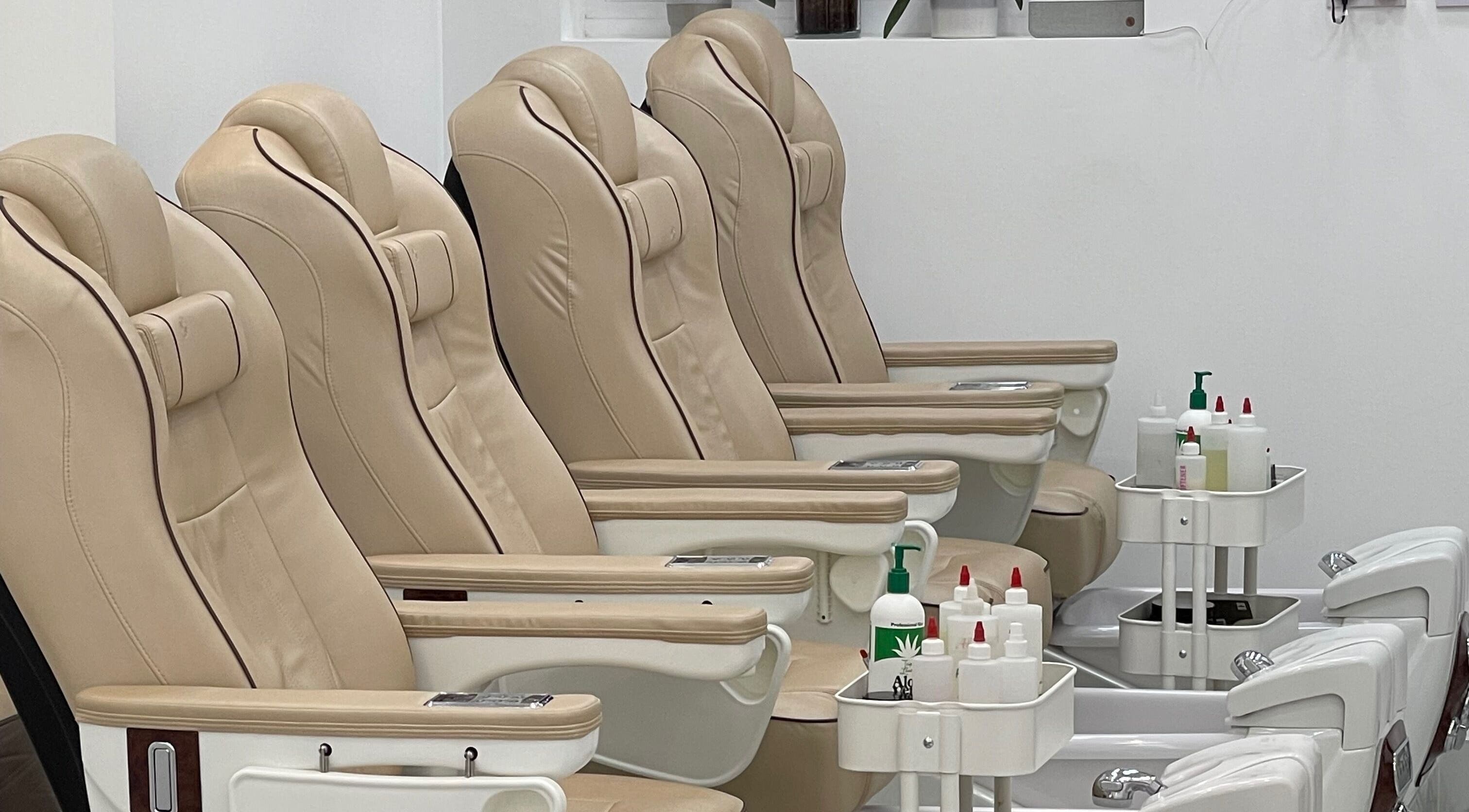 Luxurious pedicure chairs at MK Nails and Spa Fulham Ltd, London, England, GB, offering relaxation and comfort.