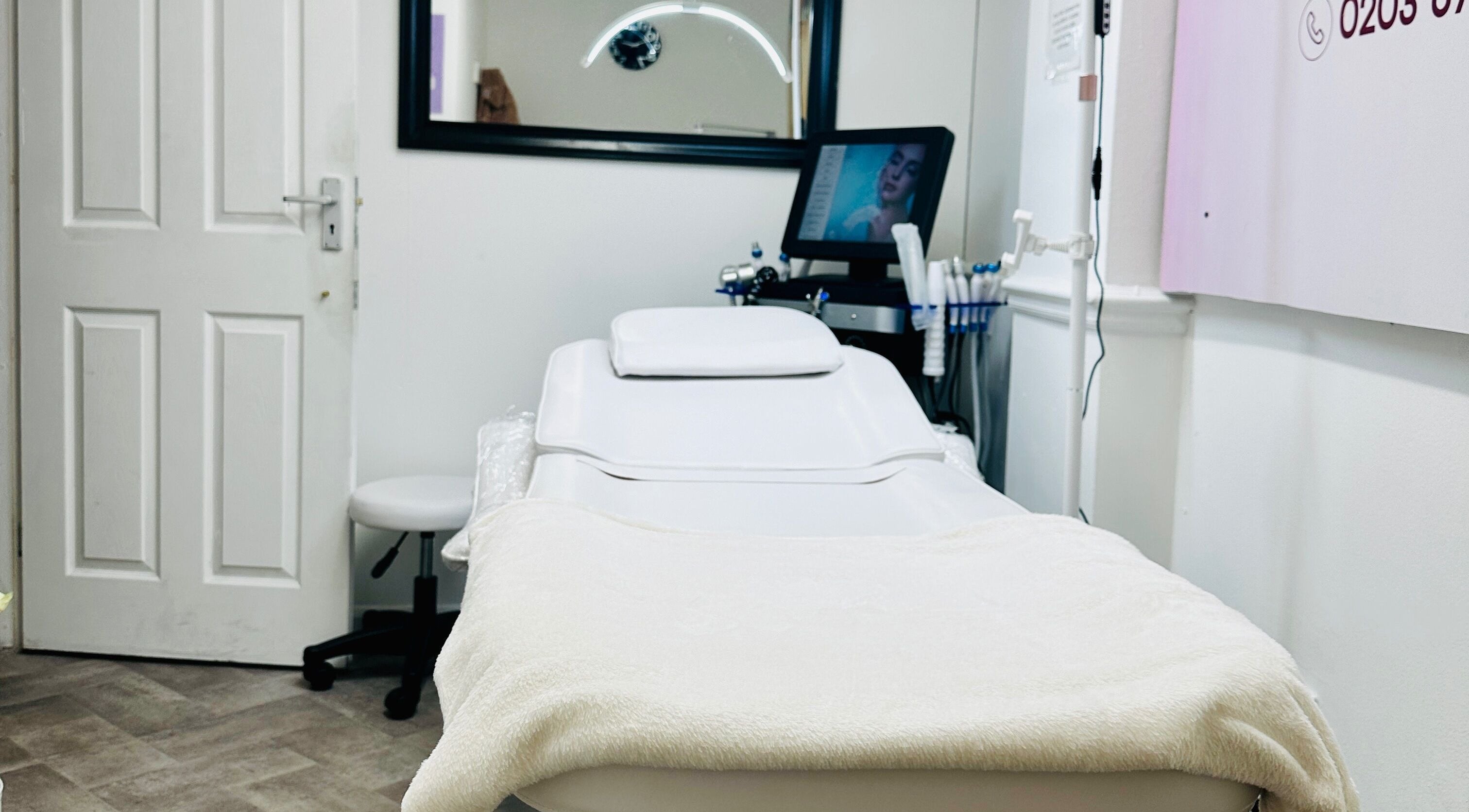 Cozy treatment room at Fama Aesthetics, Morden, England, GB, showcasing a serene and professional setting.