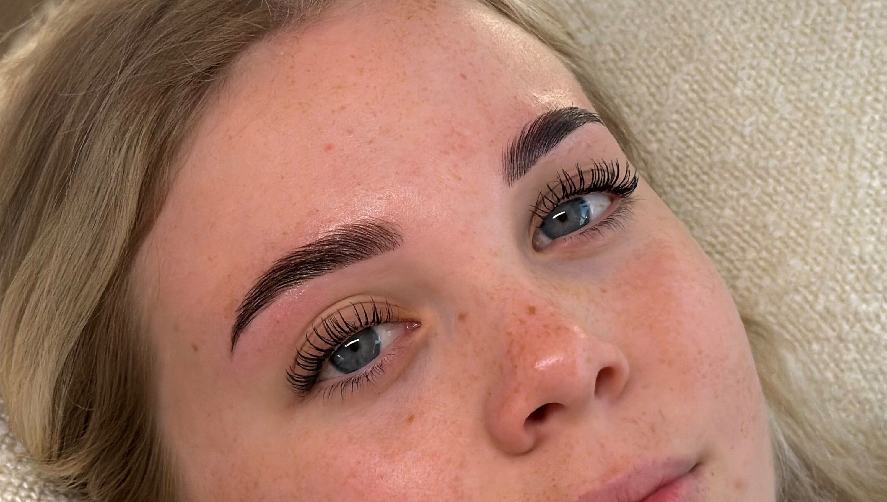 Beauty treatment at Adore Artistry in Wannanup, Western Australia, highlighting styled lashes and brows.