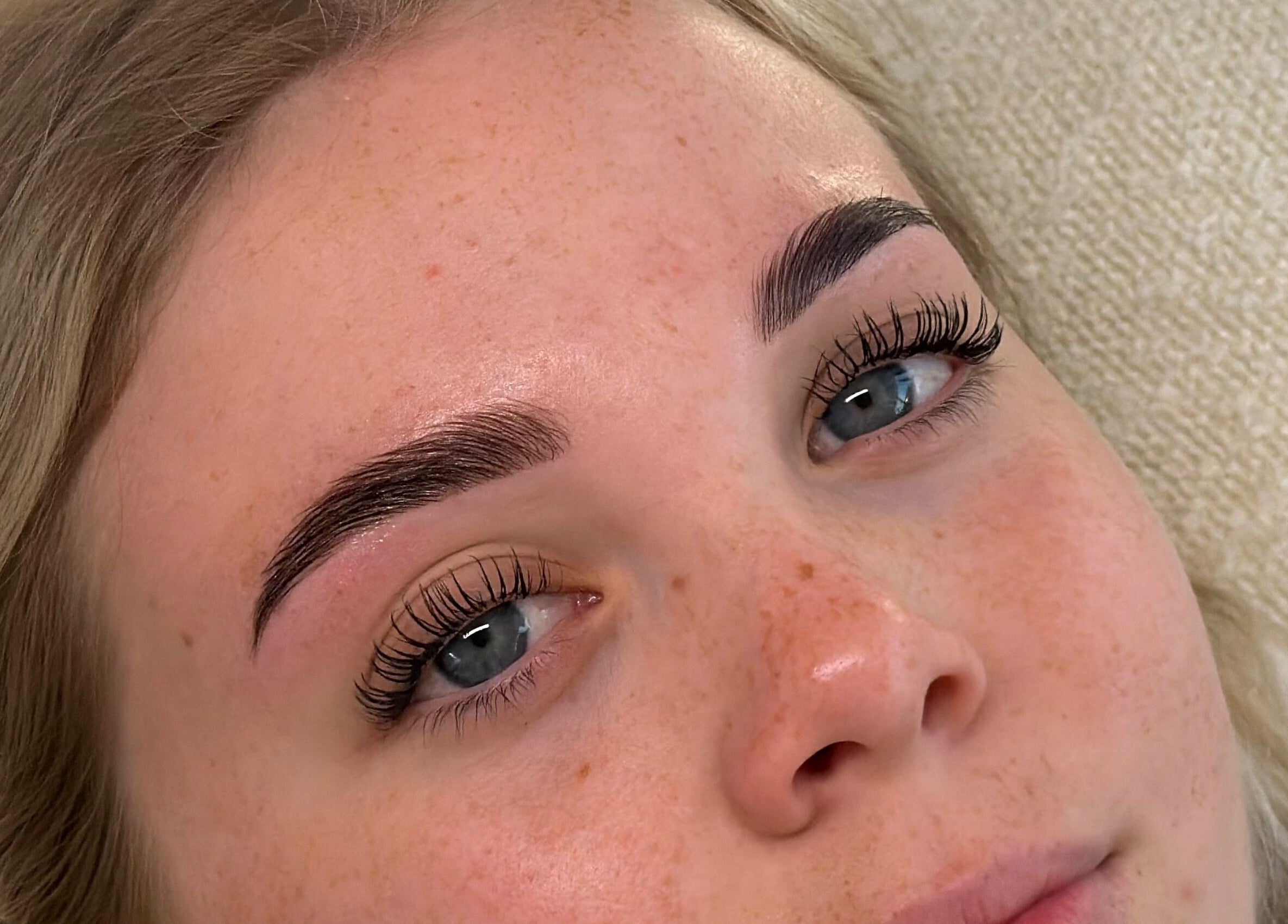 Beauty treatment at Adore Artistry in Wannanup, Western Australia, highlighting styled lashes and brows.