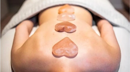 Heart-shaped stones on back at Massage2u.uk *Ladies Only*, Lawford, England, GB. Perfect for relaxation.