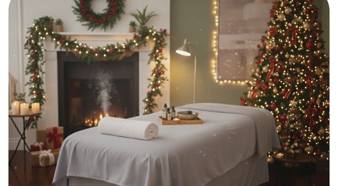 Cozy massage room at Massage2u.uk Ladies Only in Lawford, England, GB with festive Christmas decor.