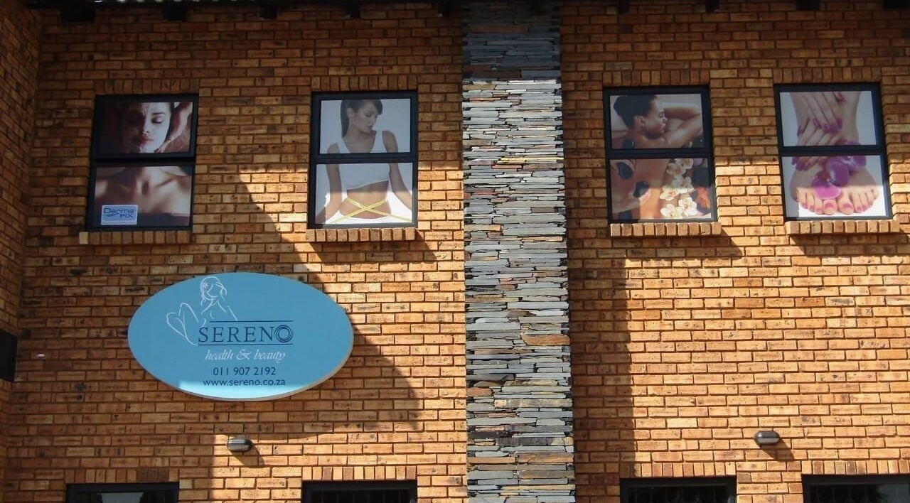 Front of Dominique's Nails, Alberton, Gauteng, ZA, featuring stylish beauty and wellness imagery.