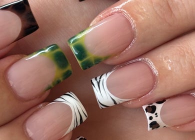 Stylish nail art designs at Anaya & CO., Saint James, Missouri, US showcasing creative and vibrant patterns.