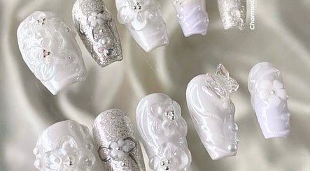 Detailed floral and pearl nail art from Kapiti Nails, Raumati Beach, Wellington Region, NZ.