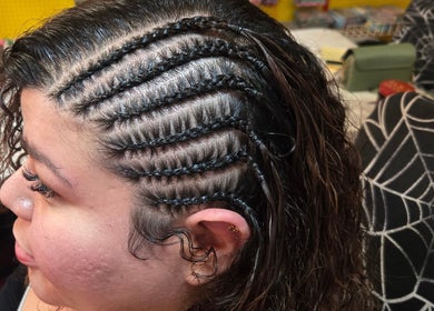 Intricate braids at Sach hair braiding Houston, TX, US showcasing artistic hairstyling.