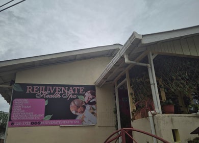 Entrance of REJUVENATE HEALTH SPA in Georgetown, Demerara-mahaica, GY with a welcoming sign.