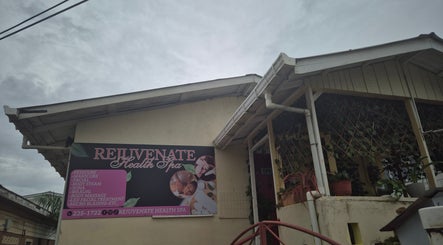 Entrance of REJUVENATE HEALTH SPA in Georgetown, Demerara-mahaica, GY with a welcoming sign.